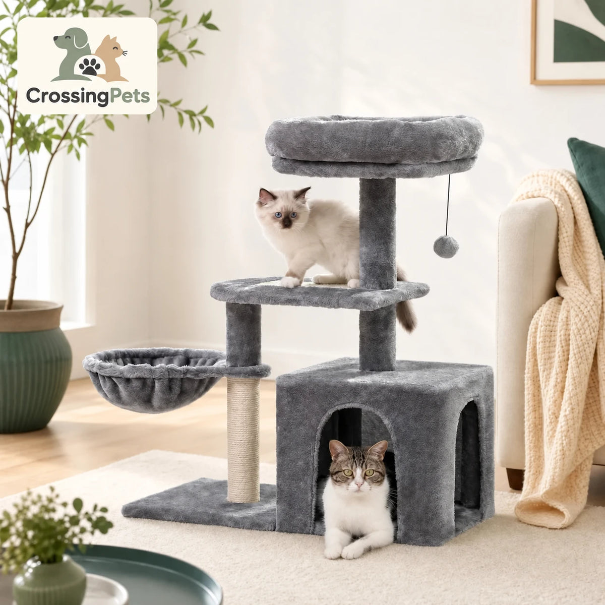 Árbol rascador gris con dos gatos y logo CrossingPets en la esquina superior izquierda.