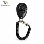 Clicker de adiestramiento con correa de muñeca — CrossingPets · imagen 1